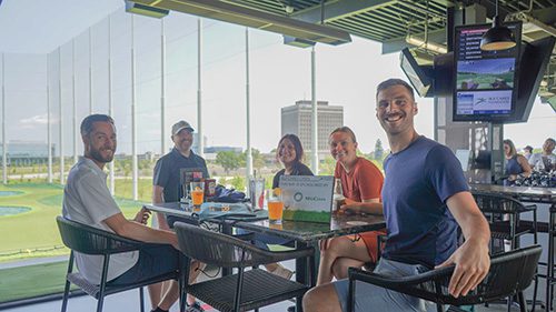 More than 130 supporters gathered at Topgolf to support Over the Rainbow, our 2023 charity partner.