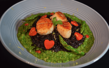 Seared Sea Scallops with Black Seafood Risotto and Asparagus-Arugula Purée