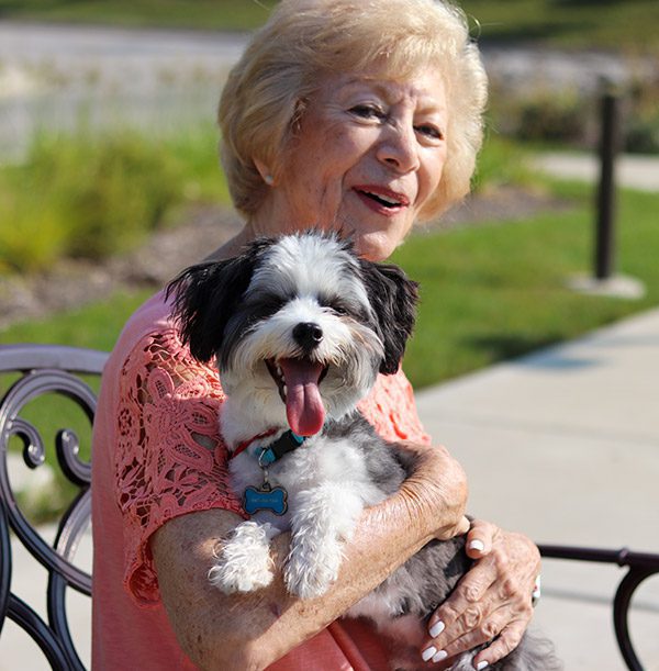 Doris gives her dog a treat1.