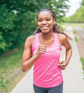 Teen goes for a run as part of her student-athlete off-season training program