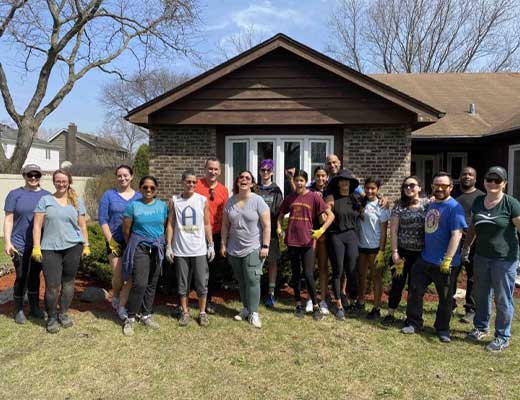 Volunteers beautify landscaping at a Glenkirk home.