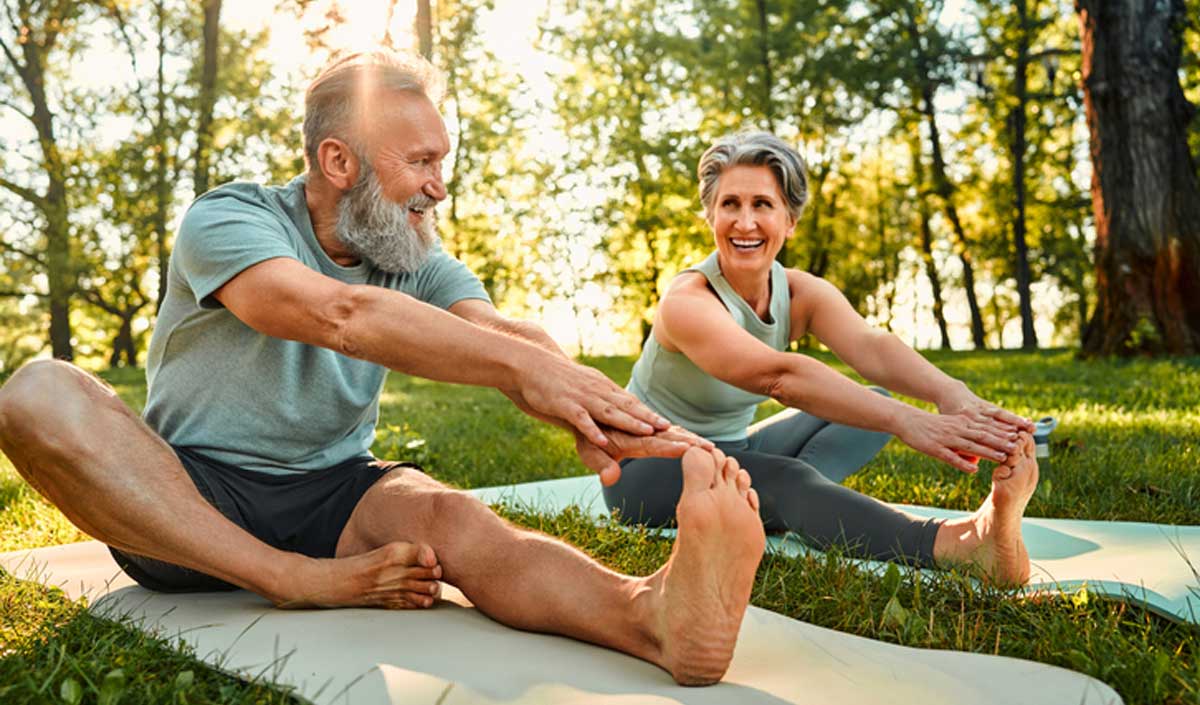 Older people exercising in the park