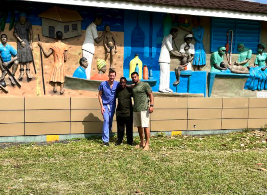 IBJI's Dr. Jasonowicz, Dr. Mulbah and Shady outside of JFK Hospital