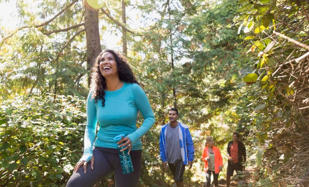 Young people hiking in the woods