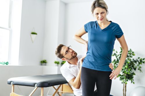 Woman suffers from common hip pain condition and seeks treatment from hip specialist.