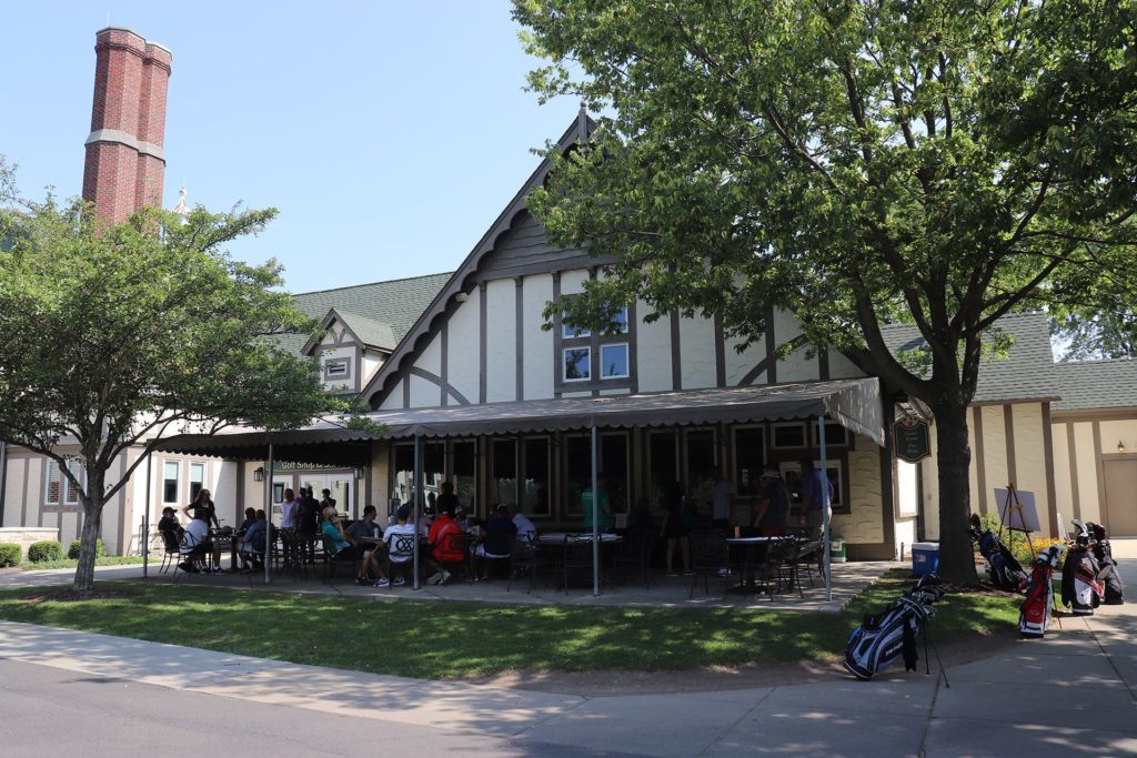 Golfers gather for lunch prior to heading out to the course at the Wheeling-based Chevy Chase Country Club.