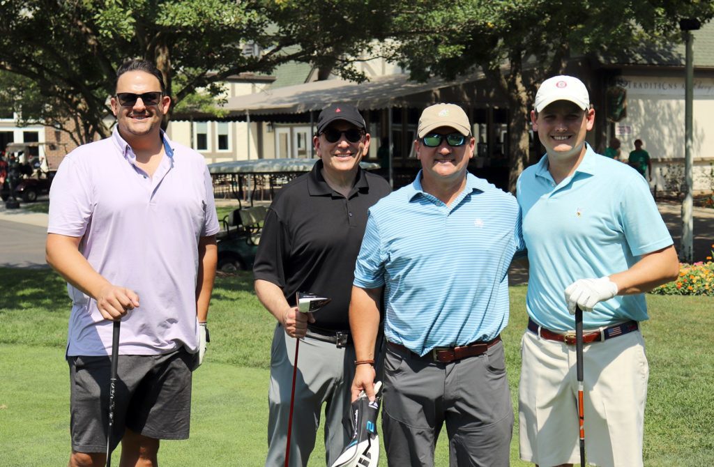 (L-R) Foursome Matt Repa, IBJI Sports Medicine Business Development; Leon Benson, MD, Orthopedic Surgeon; André Blom, IBJI CEO; and Sean Sutphen, DO, Orthopedic Surgeon, get ready to head out for the course.