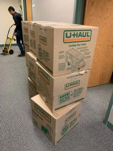 crutches in a packed uhaul box